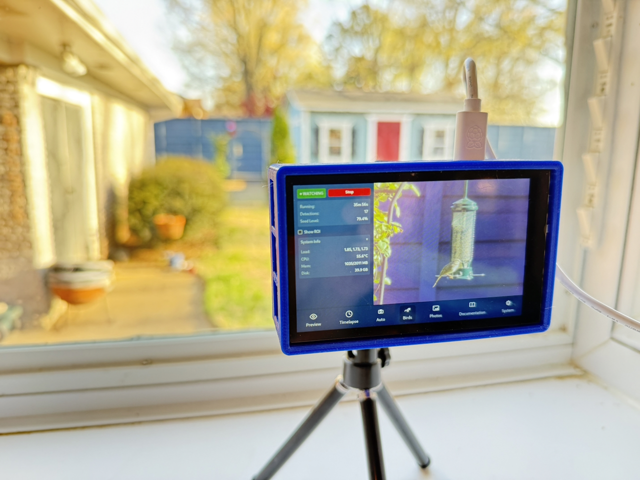 PiPiece behind the kitchen window, pointed at the bird feeder